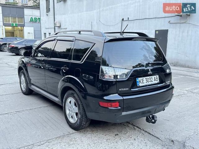 Черный Мицубиси Аутлендер, объемом двигателя 2 л и пробегом 150 тыс. км за 10200 $, фото 8 на Automoto.ua