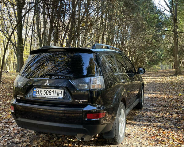 Міцубісі Аутлендер 2011 у Хмельницькому на Automoto.ua Чорний Міцубісі Аутлендер, об'ємом двигуна 2 л та пробігом 196 тис. км за 9500 $, фото 31 на Automoto.ua