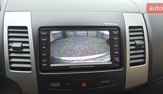 Черный Мицубиси Аутлендер, объемом двигателя 2.2 л и пробегом 209 тыс. км за 12700 $, фото 26 на Automoto.ua