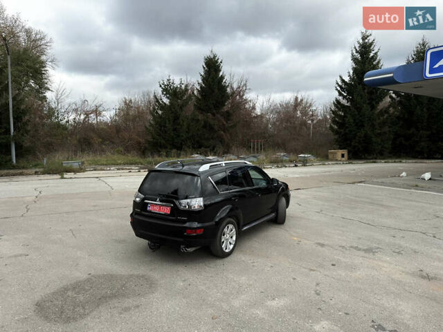 Міцубісі Аутлендер 2011 у Бердичеве на Automoto.ua Чорний Міцубісі Аутлендер, об'ємом двигуна 2.2 л та пробігом 237 тис. км за 11499 $, фото 19 на Automoto.ua