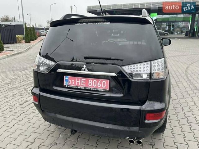 Черный Мицубиси Аутлендер, объемом двигателя 2.2 л и пробегом 226 тыс. км за 10750 $, фото 22 на Automoto.ua