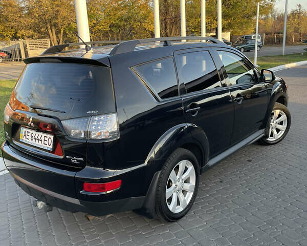 Чорний Міцубісі Аутлендер, об'ємом двигуна 2.4 л та пробігом 93 тис. км за 12500 $, фото 4 на Automoto.ua