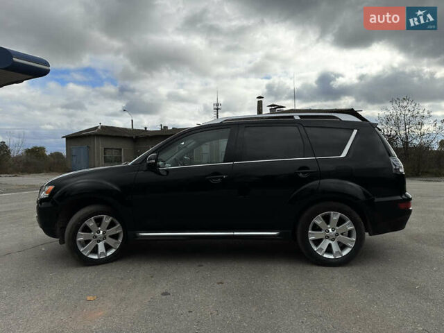 Чорний Міцубісі Аутлендер, об'ємом двигуна 2.2 л та пробігом 236 тис. км за 11399 $, фото 8 на Automoto.ua