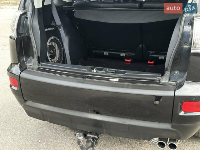 Чорний Міцубісі Аутлендер, об'ємом двигуна 2.2 л та пробігом 236 тис. км за 11399 $, фото 75 на Automoto.ua