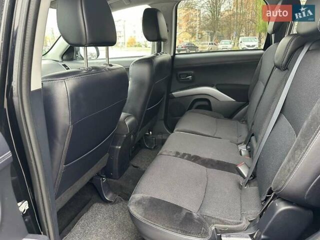 Черный Мицубиси Аутлендер, объемом двигателя 2.2 л и пробегом 226 тыс. км за 10750 $, фото 12 на Automoto.ua