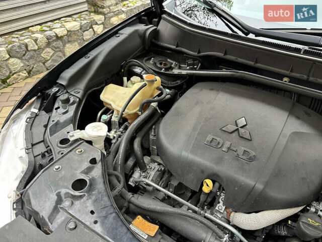 Чорний Міцубісі Аутлендер, об'ємом двигуна 2.2 л та пробігом 216 тис. км за 12000 $, фото 25 на Automoto.ua