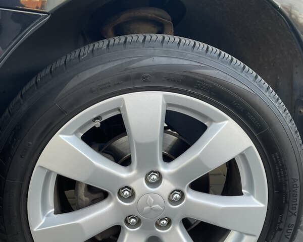 Чорний Міцубісі Аутлендер, об'ємом двигуна 2.4 л та пробігом 93 тис. км за 12500 $, фото 9 на Automoto.ua