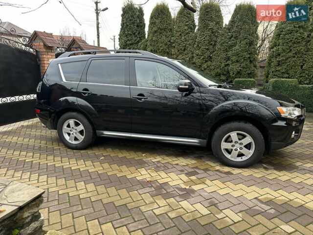 Чорний Міцубісі Аутлендер, об'ємом двигуна 2.2 л та пробігом 216 тис. км за 12000 $, фото 2 на Automoto.ua