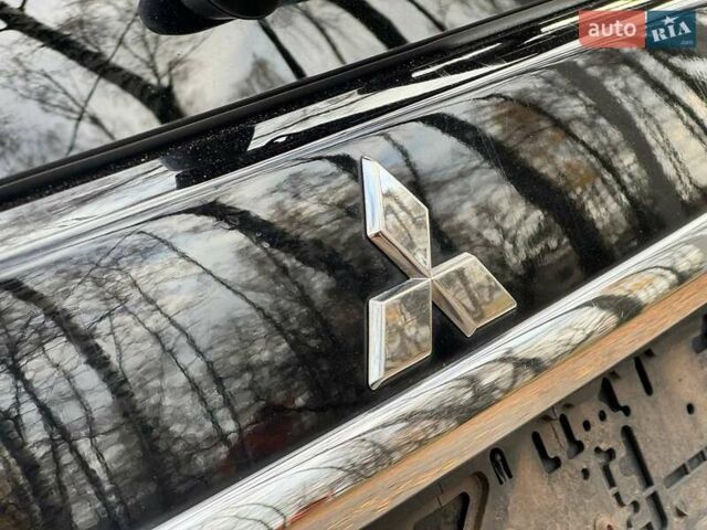 Чорний Міцубісі Аутлендер, об'ємом двигуна 2.2 л та пробігом 155 тис. км за 11599 $, фото 10 на Automoto.ua