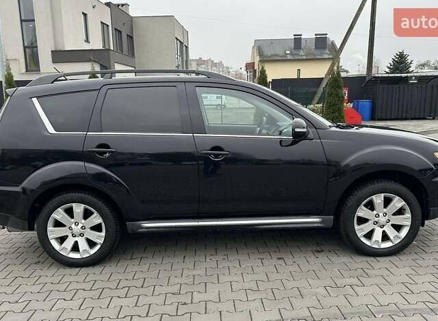 Черный Мицубиси Аутлендер, объемом двигателя 2.2 л и пробегом 226 тыс. км за 10750 $, фото 26 на Automoto.ua