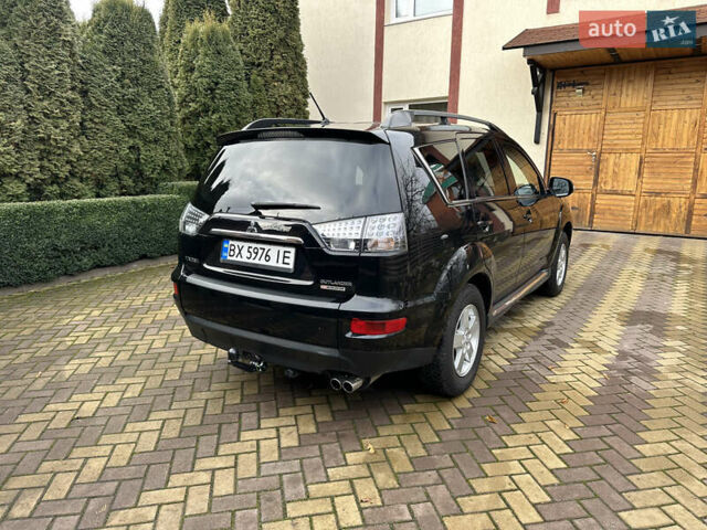 Чорний Міцубісі Аутлендер, об'ємом двигуна 2.2 л та пробігом 216 тис. км за 12000 $, фото 4 на Automoto.ua