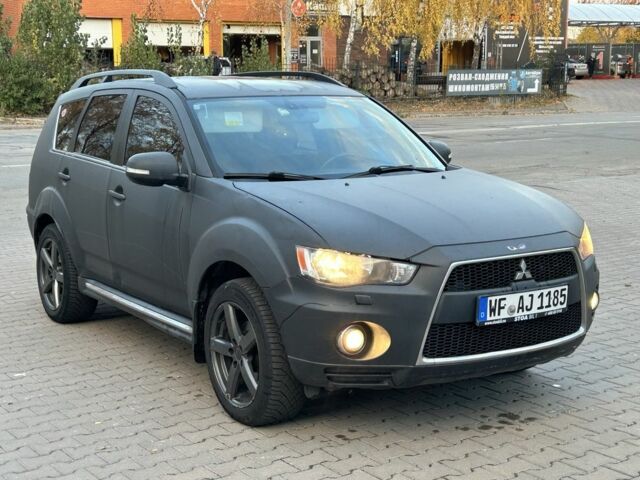 Чорний Міцубісі Аутлендер, об'ємом двигуна 2 л та пробігом 250 тис. км за 4450 $, фото 6 на Automoto.ua