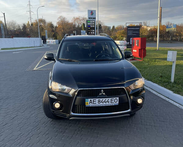 Чорний Міцубісі Аутлендер, об'ємом двигуна 2.4 л та пробігом 93 тис. км за 12500 $, фото 2 на Automoto.ua