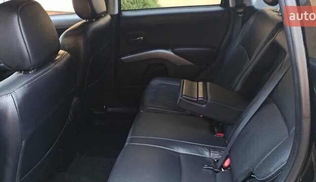 Черный Мицубиси Аутлендер, объемом двигателя 2.2 л и пробегом 209 тыс. км за 12700 $, фото 30 на Automoto.ua