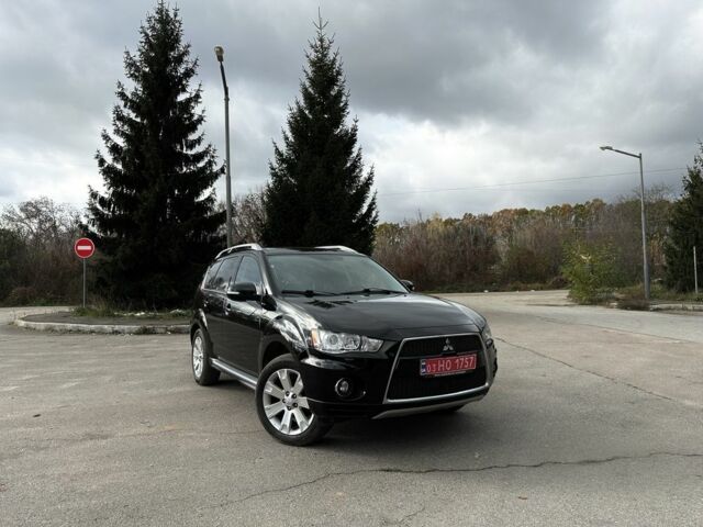 Черный Мицубиси Аутлендер, объемом двигателя 2.2 л и пробегом 237 тыс. км за 11450 $, фото 1 на Automoto.ua