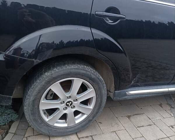 Черный Мицубиси Аутлендер, объемом двигателя 2 л и пробегом 196 тыс. км за 9900 $, фото 8 на Automoto.ua