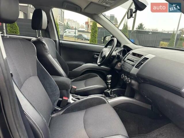 Черный Мицубиси Аутлендер, объемом двигателя 2.2 л и пробегом 226 тыс. км за 10750 $, фото 33 на Automoto.ua