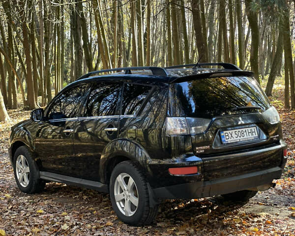 Міцубісі Аутлендер 2011 у Хмельницькому на Automoto.ua Чорний Міцубісі Аутлендер, об'ємом двигуна 2 л та пробігом 196 тис. км за 9500 $, фото 3 на Automoto.ua