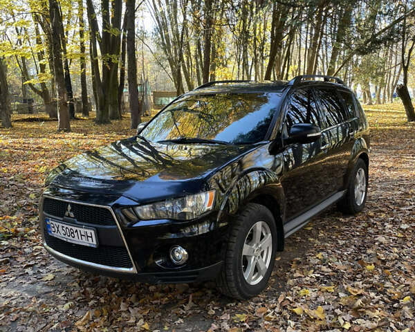 Міцубісі Аутлендер 2011 у Хмельницькому на Automoto.ua Чорний Міцубісі Аутлендер, об'ємом двигуна 2 л та пробігом 196 тис. км за 9500 $, фото 25 на Automoto.ua