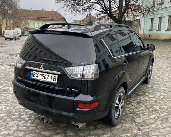 Черный Мицубиси Аутлендер, объемом двигателя 2.27 л и пробегом 233 тыс. км за 10500 $, фото 6 на Automoto.ua