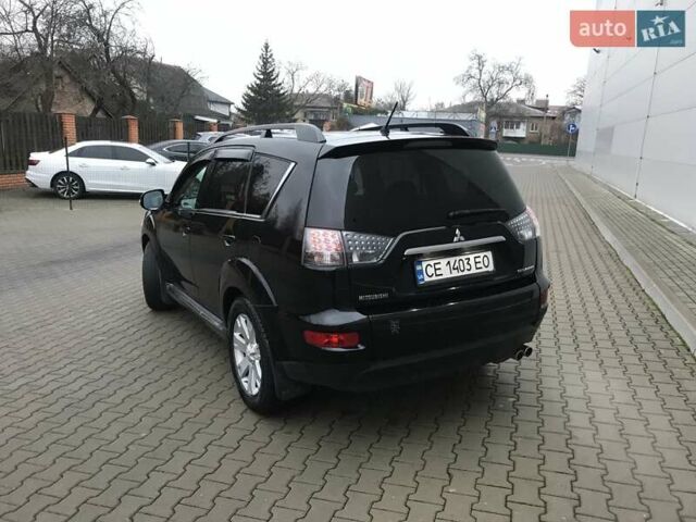 Чорний Міцубісі Аутлендер, об'ємом двигуна 2.18 л та пробігом 295 тис. км за 10900 $, фото 3 на Automoto.ua