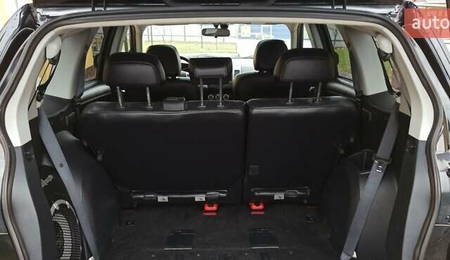 Черный Мицубиси Аутлендер, объемом двигателя 2.2 л и пробегом 209 тыс. км за 12700 $, фото 36 на Automoto.ua