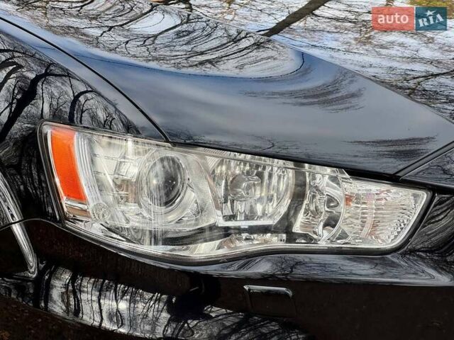 Чорний Міцубісі Аутлендер, об'ємом двигуна 2.2 л та пробігом 155 тис. км за 11599 $, фото 8 на Automoto.ua