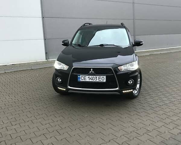 Чорний Міцубісі Аутлендер, об'ємом двигуна 2.18 л та пробігом 295 тис. км за 10900 $, фото 7 на Automoto.ua