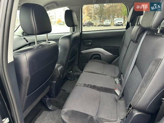 Черный Мицубиси Аутлендер, объемом двигателя 2.2 л и пробегом 226 тыс. км за 10750 $, фото 35 на Automoto.ua