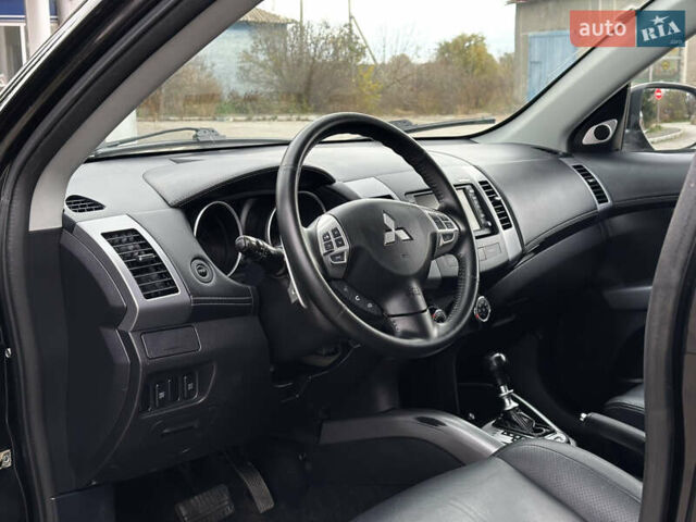 Міцубісі Аутлендер 2011 у Бердичеве на Automoto.ua Чорний Міцубісі Аутлендер, об'ємом двигуна 2.2 л та пробігом 237 тис. км за 11499 $, фото 34 на Automoto.ua