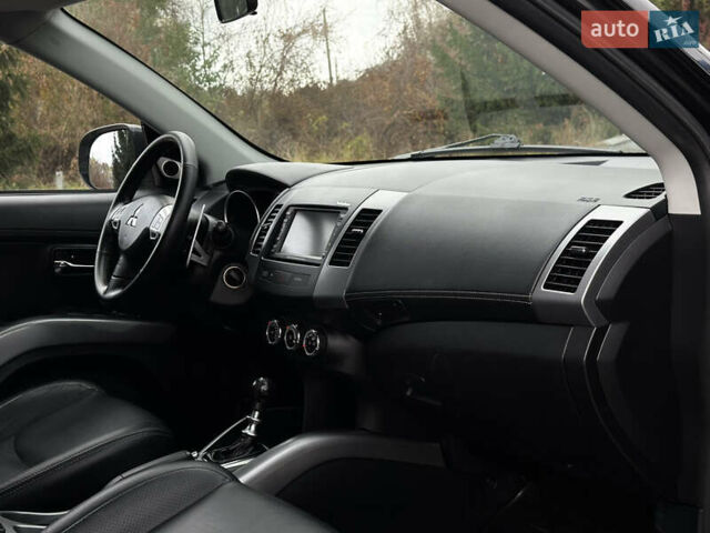 Міцубісі Аутлендер 2011 у Бердичеве на Automoto.ua Чорний Міцубісі Аутлендер, об'ємом двигуна 2.2 л та пробігом 237 тис. км за 11499 $, фото 51 на Automoto.ua