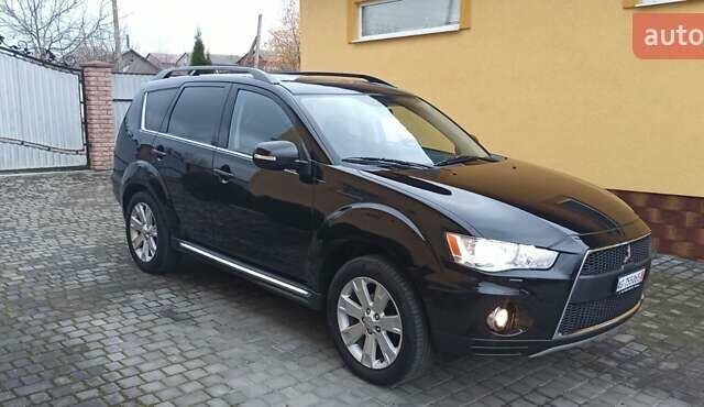 Черный Мицубиси Аутлендер, объемом двигателя 2.2 л и пробегом 209 тыс. км за 12700 $, фото 7 на Automoto.ua