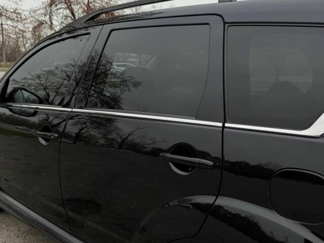 Черный Мицубиси Аутлендер, объемом двигателя 2.2 л и пробегом 253 тыс. км за 12500 $, фото 3 на Automoto.ua