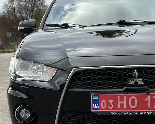 Міцубісі Аутлендер 2011 у Бердичеве на Automoto.ua Чорний Міцубісі Аутлендер, об'ємом двигуна 2.2 л та пробігом 237 тис. км за 11499 $, фото 15 на Automoto.ua