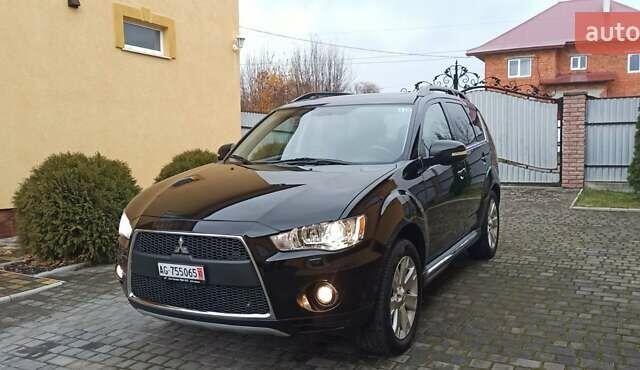 Черный Мицубиси Аутлендер, объемом двигателя 2.2 л и пробегом 209 тыс. км за 12700 $, фото 6 на Automoto.ua