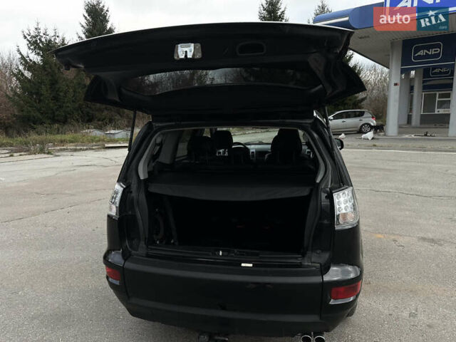 Чорний Міцубісі Аутлендер, об'ємом двигуна 2.2 л та пробігом 236 тис. км за 11399 $, фото 72 на Automoto.ua