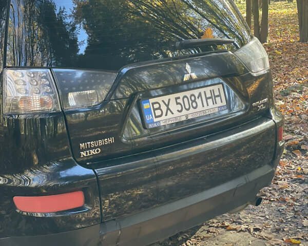 Міцубісі Аутлендер 2011 у Хмельницькому на Automoto.ua Чорний Міцубісі Аутлендер, об'ємом двигуна 2 л та пробігом 196 тис. км за 9500 $, фото 5 на Automoto.ua