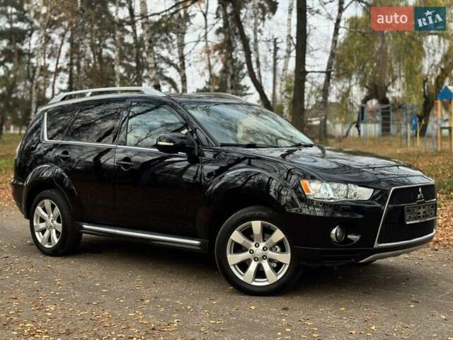 Чорний Міцубісі Аутлендер, об'ємом двигуна 2.2 л та пробігом 155 тис. км за 11599 $, фото 1 на Automoto.ua