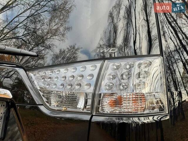 Чорний Міцубісі Аутлендер, об'ємом двигуна 2.2 л та пробігом 155 тис. км за 11599 $, фото 15 на Automoto.ua