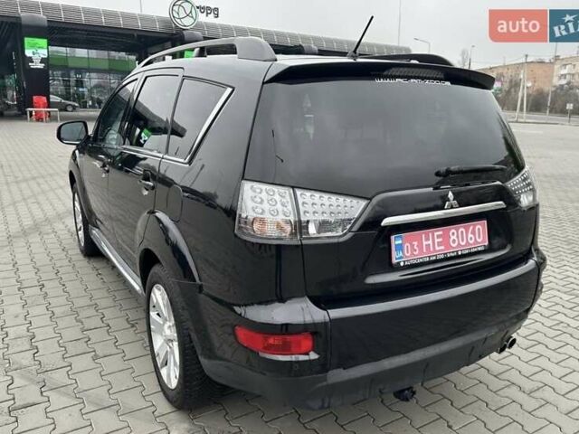 Черный Мицубиси Аутлендер, объемом двигателя 2.2 л и пробегом 226 тыс. км за 10750 $, фото 18 на Automoto.ua
