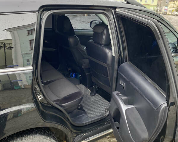 Черный Мицубиси Аутлендер, объемом двигателя 2.27 л и пробегом 233 тыс. км за 10500 $, фото 11 на Automoto.ua