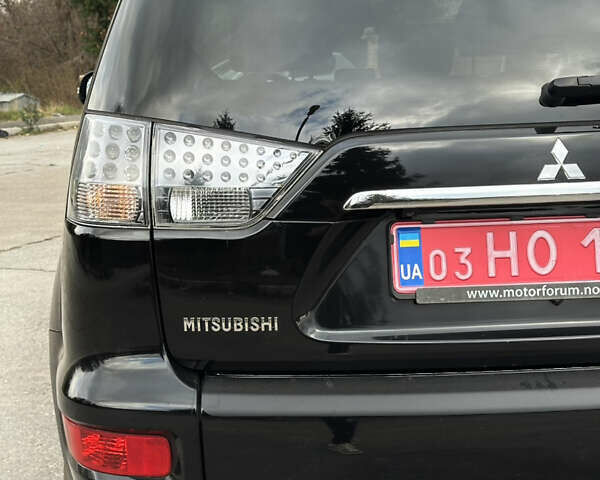 Міцубісі Аутлендер 2011 у Бердичеве на Automoto.ua Чорний Міцубісі Аутлендер, об'ємом двигуна 2.2 л та пробігом 237 тис. км за 11499 $, фото 79 на Automoto.ua