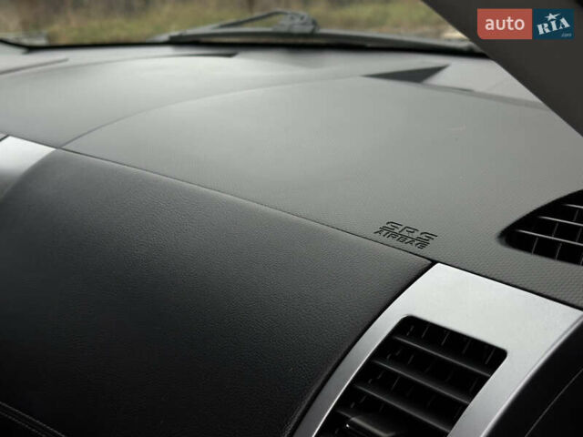 Чорний Міцубісі Аутлендер, об'ємом двигуна 2.2 л та пробігом 236 тис. км за 11399 $, фото 54 на Automoto.ua