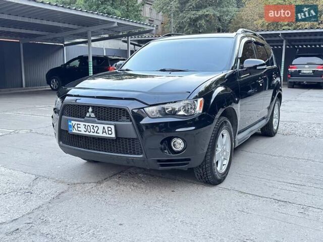 Черный Мицубиси Аутлендер, объемом двигателя 2 л и пробегом 150 тыс. км за 10200 $, фото 6 на Automoto.ua