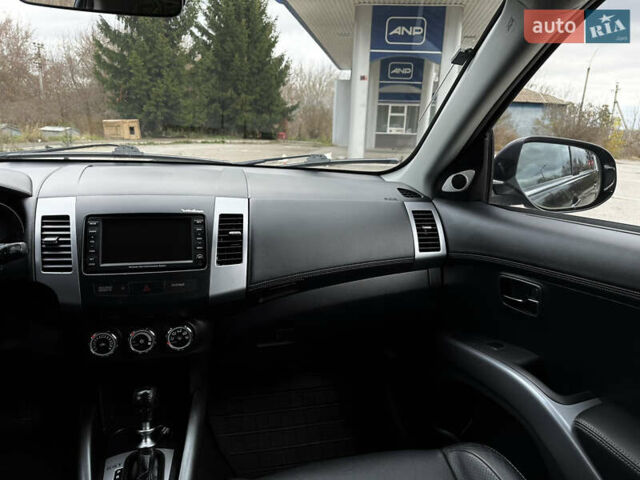 Чорний Міцубісі Аутлендер, об'ємом двигуна 2.2 л та пробігом 236 тис. км за 11399 $, фото 45 на Automoto.ua