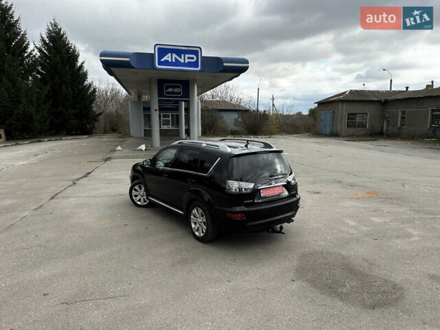 Міцубісі Аутлендер 2011 у Бердичеве на Automoto.ua Чорний Міцубісі Аутлендер, об'ємом двигуна 2.2 л та пробігом 237 тис. км за 11499 $, фото 20 на Automoto.ua