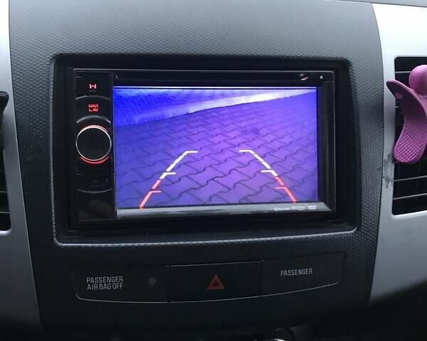 Чорний Міцубісі Аутлендер, об'ємом двигуна 2.18 л та пробігом 295 тис. км за 10900 $, фото 12 на Automoto.ua