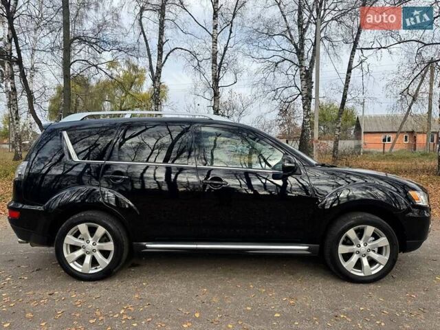 Чорний Міцубісі Аутлендер, об'ємом двигуна 2.2 л та пробігом 155 тис. км за 11599 $, фото 27 на Automoto.ua