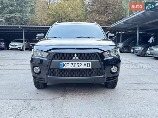 Черный Мицубиси Аутлендер, объемом двигателя 2 л и пробегом 150 тыс. км за 10200 $, фото 4 на Automoto.ua