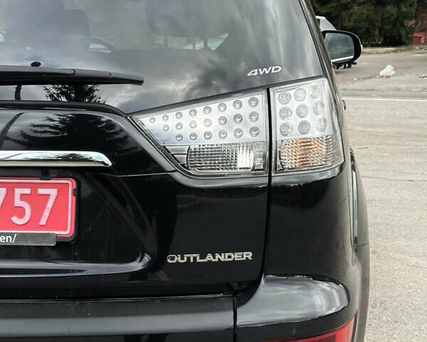 Міцубісі Аутлендер 2011 у Бердичеве на Automoto.ua Чорний Міцубісі Аутлендер, об'ємом двигуна 2.2 л та пробігом 237 тис. км за 11499 $, фото 78 на Automoto.ua